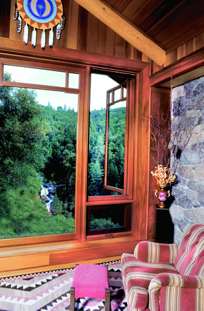 Michael’s favorite room is his office, which offers a breathtaking view of the Rock Creek waterfall. Michael likes the rustic feel of the stone and the ponderosa pine beams in this room.